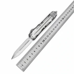 switchblade mes OTF met transparant handvat