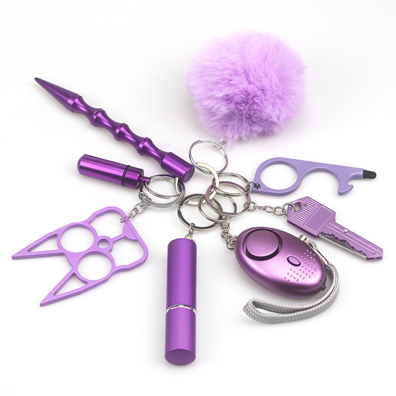 Sleutelhanger – 8-delig multifunctioneel paars Sleutelhanger – 8-delig multifunctioneel paars